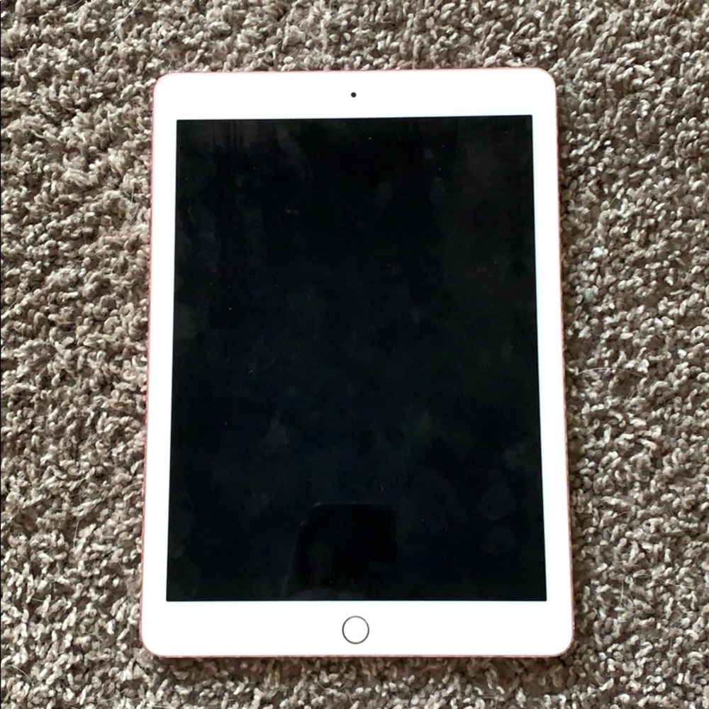iPad rose gold with 2 cases and charger